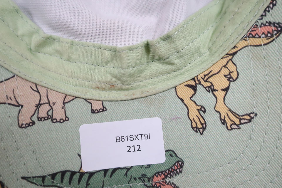 Cap with dinosaurs from Lindex - Size 116/122 - Green