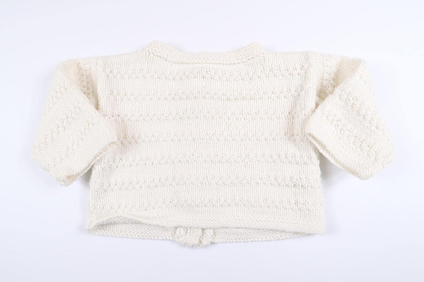 White hand-knitted cardigan in size 74/80