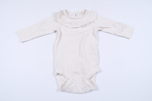 White long-sleeved bodysuit with lace detail from Newbie in size 56