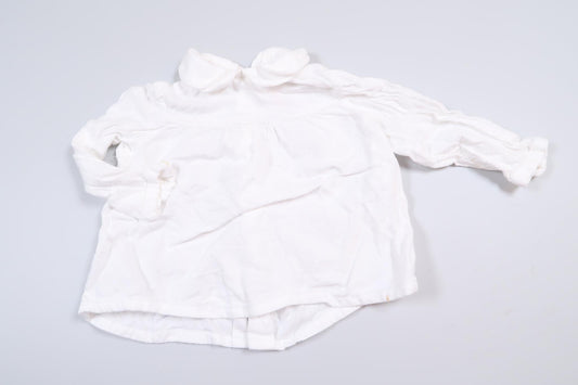 White long-sleeved blouse from Zara in size 68