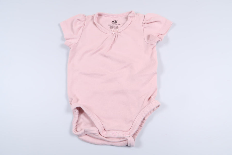 Pink bodysuit from H&M in size 62