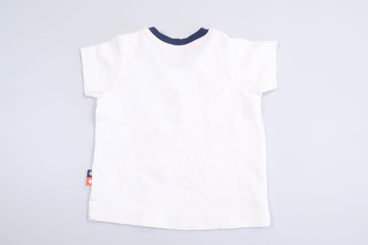 White short-sleeved shirt from Bambino Piccolo in size 0-3 M