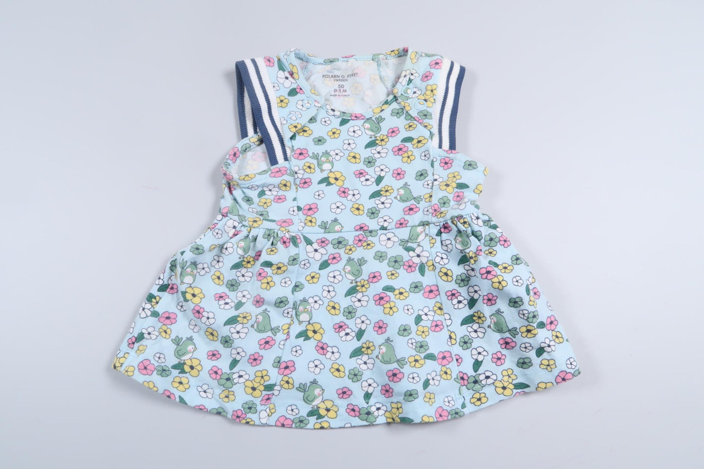 Blue dress with flowers from Polarn o. Pyret in size 50