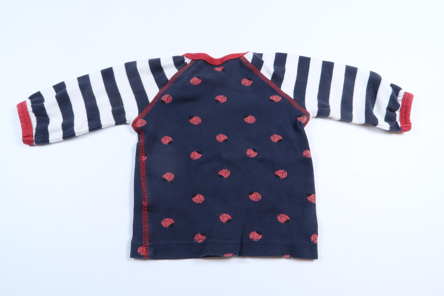 Navy blue long-sleeved shirt with ladybugs from Kappahl in size 62
