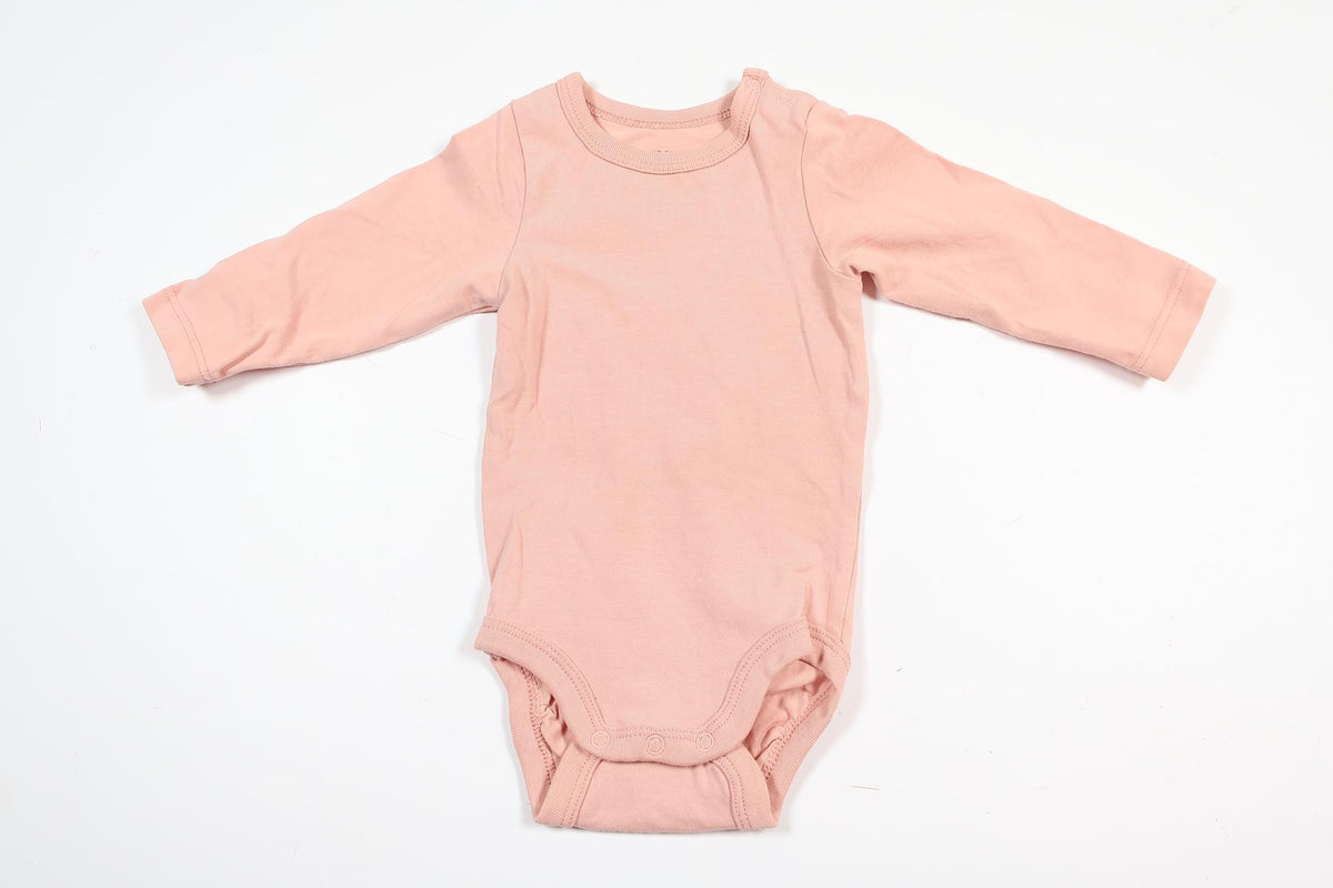 Pink long-sleeved bodysuit from Lindex in size 56