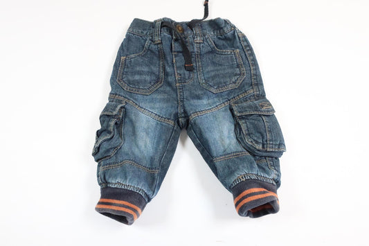 Put on lightly lined jeans from Early Days in size 3-6 M.