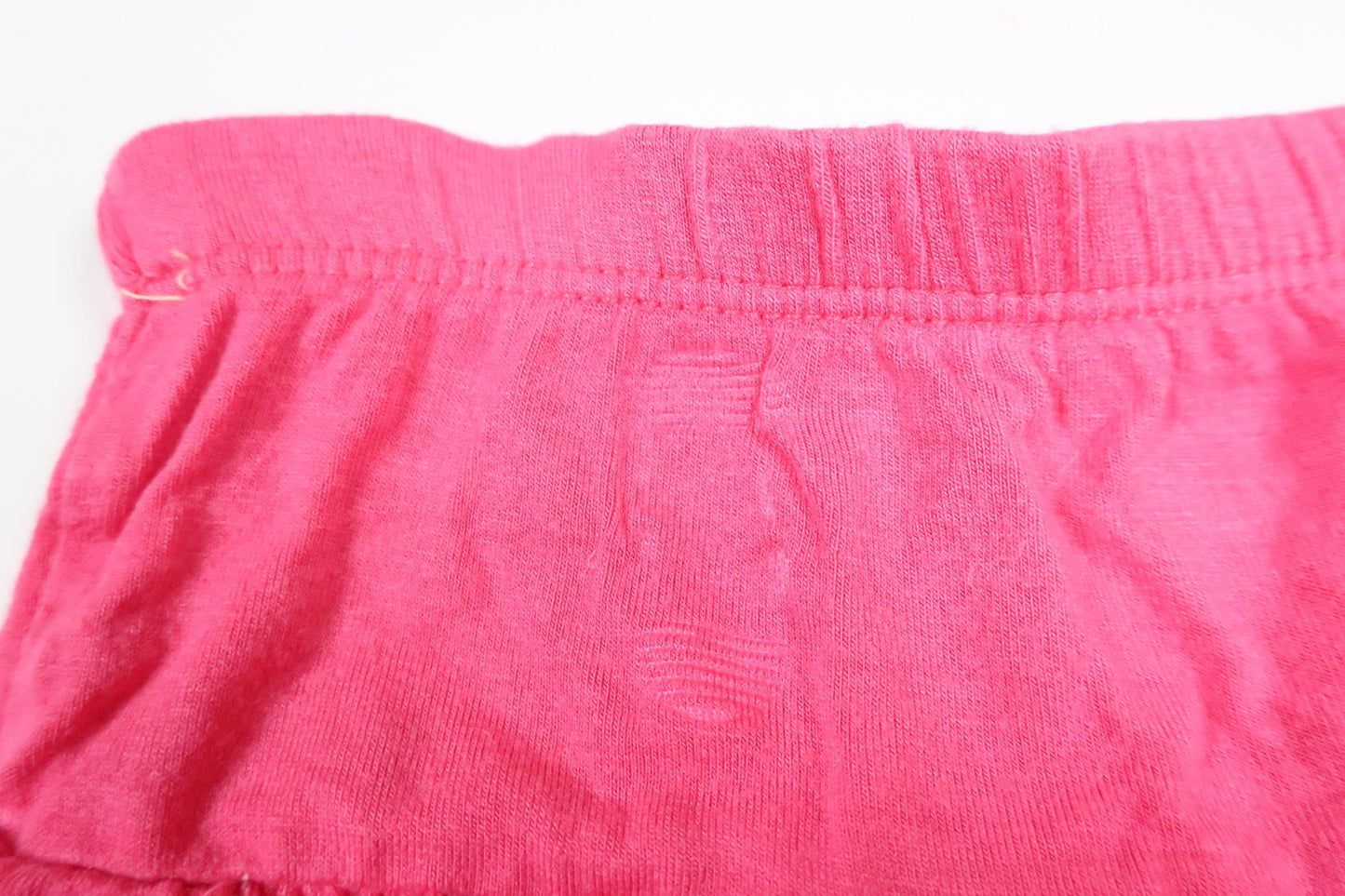 Pink pants with built-in skirt in size 68/74