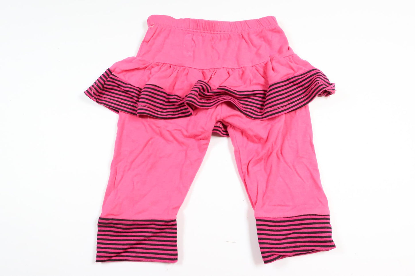 Pink pants with built-in skirt in size 68/74