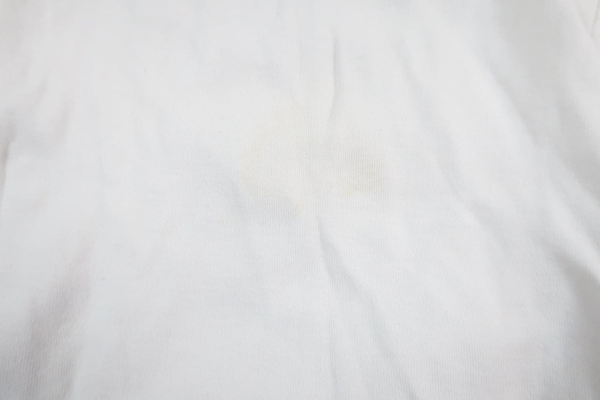White long-sleeved bodysuit with bear from Name It in size 62
