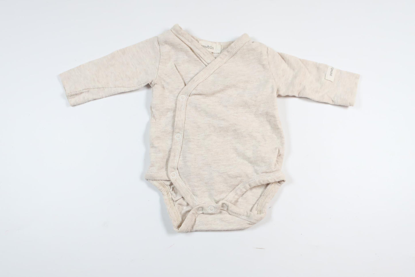 Beige long-sleeved wrap bodysuit from Newbie in size 44