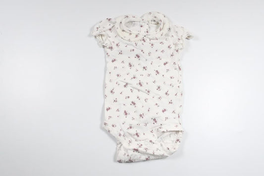 Floral bodysuit from Newbie - Size 68 - White