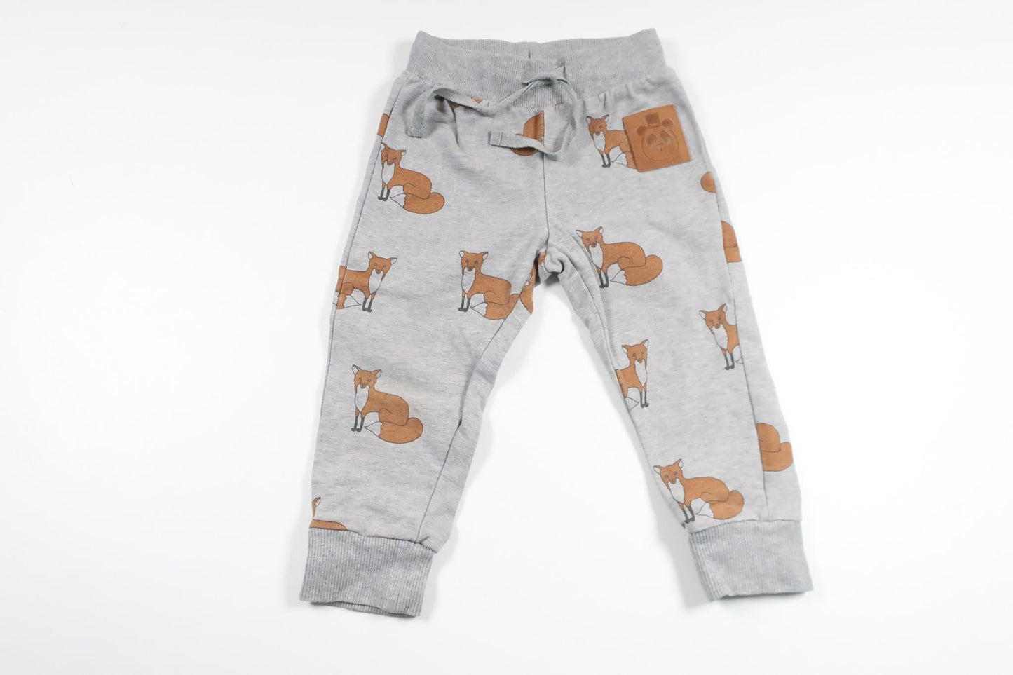 Pants with foxes from Mini Rodini - Size 68/74 - Grey