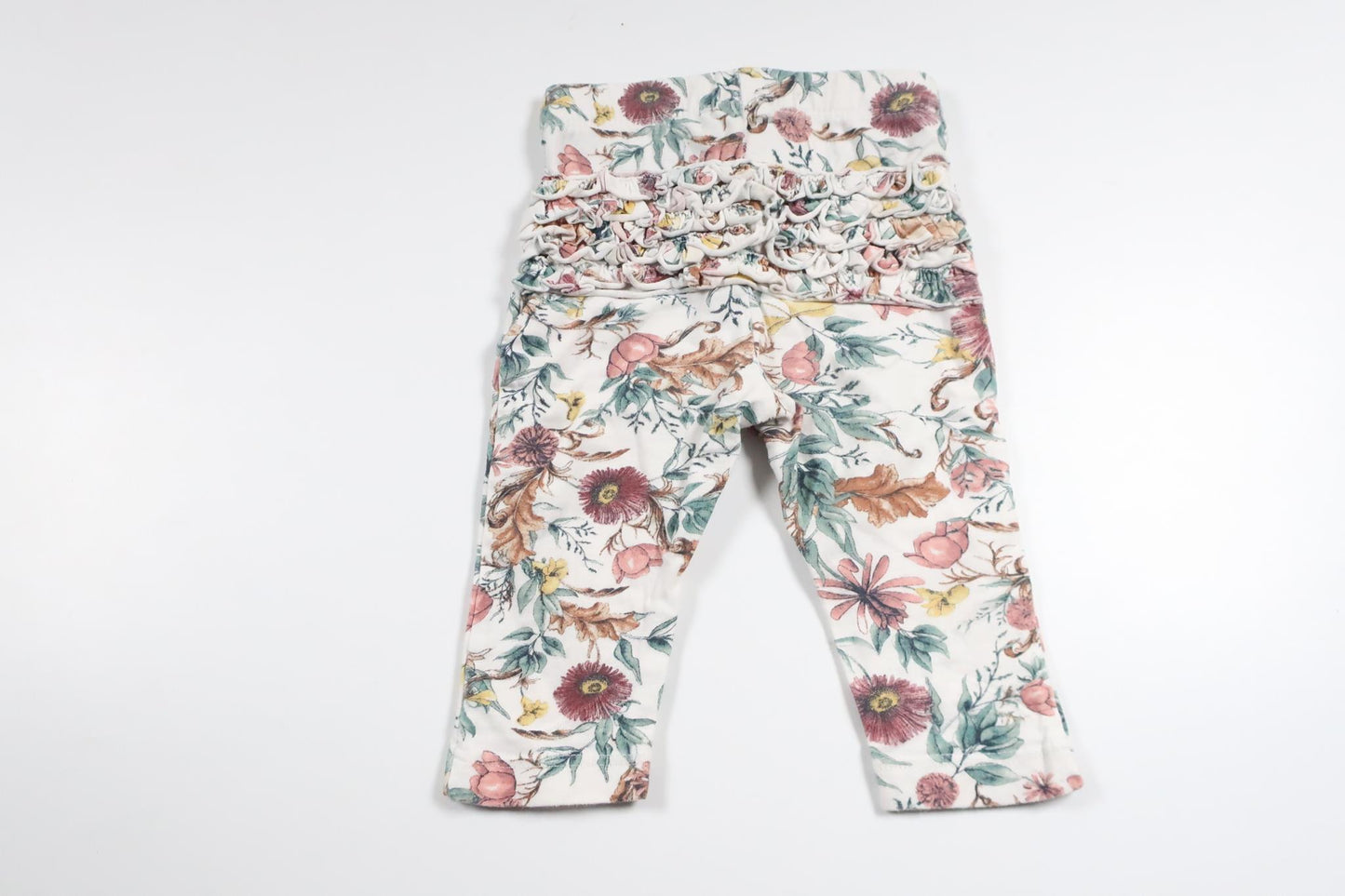 Floral trousers with ruffles from Lindex - Size 62 - Multi