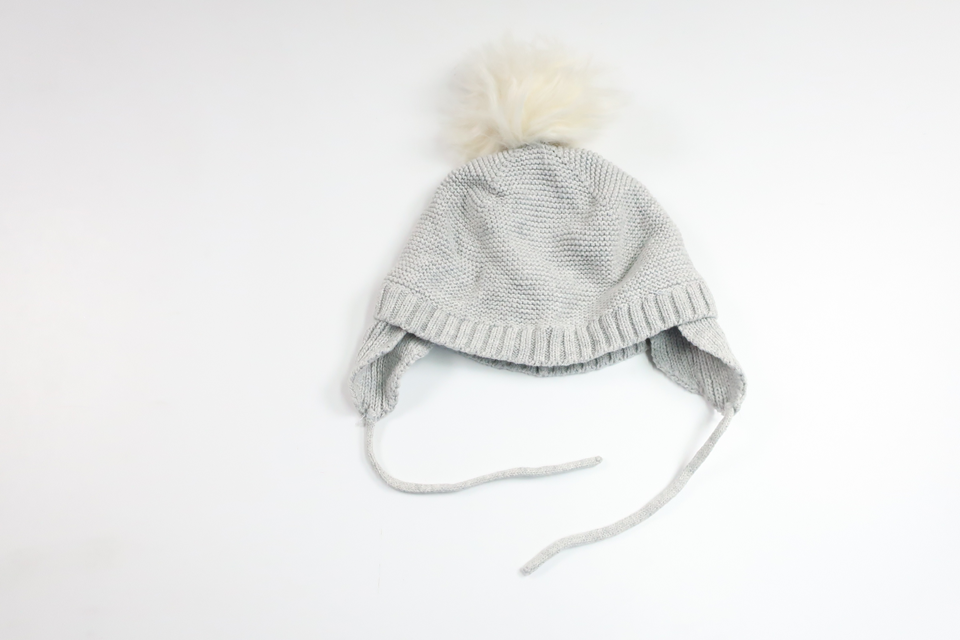 Knitted hat with tassel from Newbie - Size 48/50 - Grey
