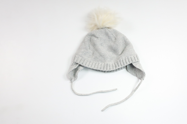 Knitted hat with tassel from Newbie - Size 48/50 - Grey