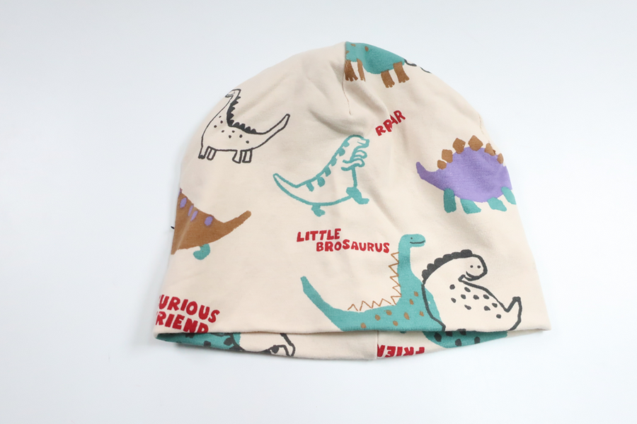 Hat with dinosaurs from H&amp;M - Size 62/68 - Off-white