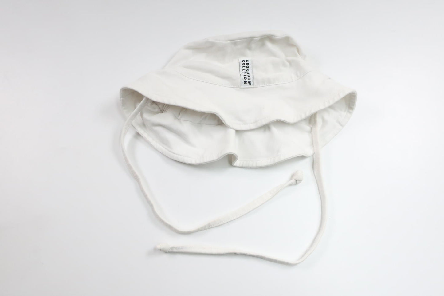 Soft sun hat from Geggamoja - Size 80/86 - White