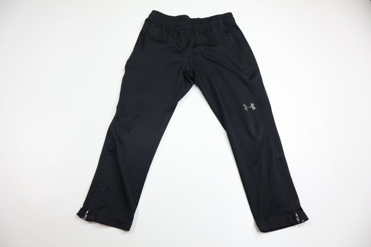 Träningsbyxor från Under Armor - Storlek 110/116 - Svart