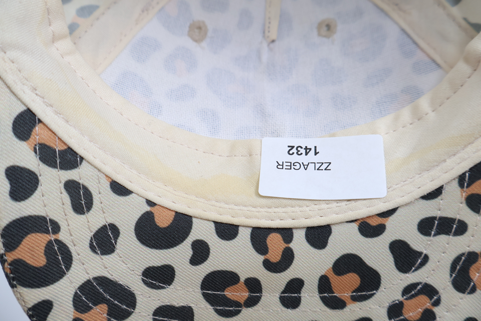 Leopard print cap from Kappahl - Size 44/46 - Beige