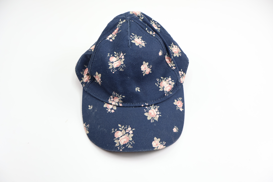 Blommig keps från Newbie - Storlek 48/50 - Marinblå