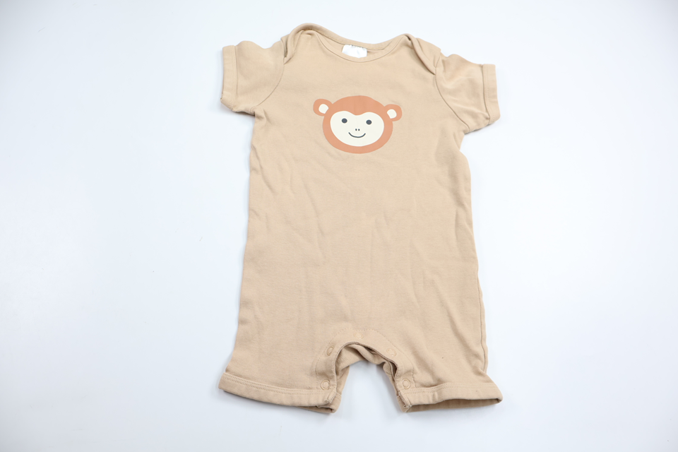 Pyjamas med apa från Kappahl - Storlek 62/68 - Beige